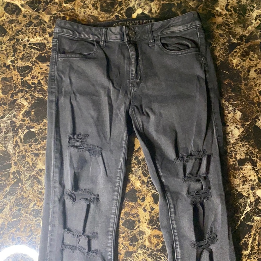 Ripped Black American Eagle Jeans.